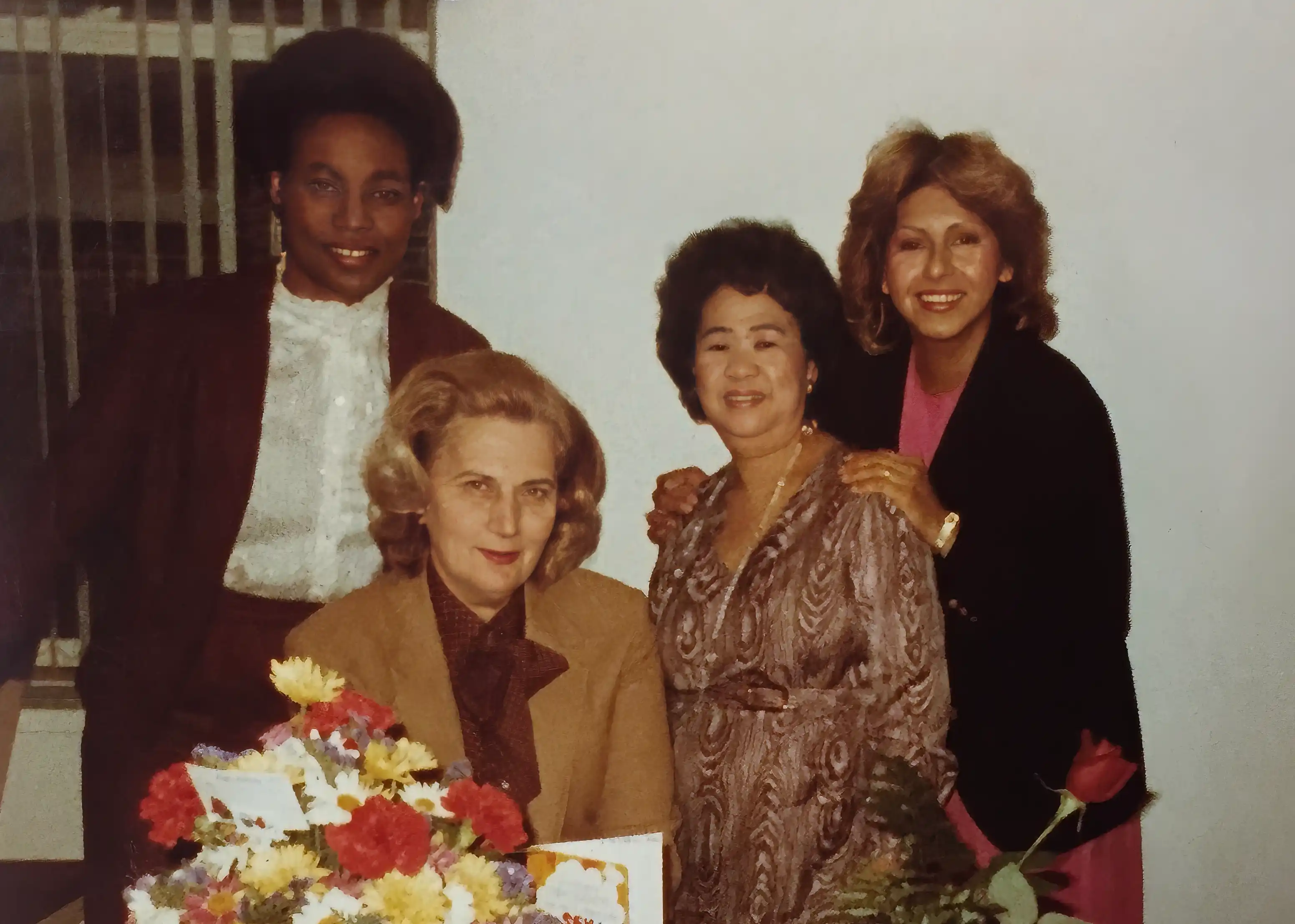 Sonia, in her twenties, with a group of her diverse colleagues and friends.